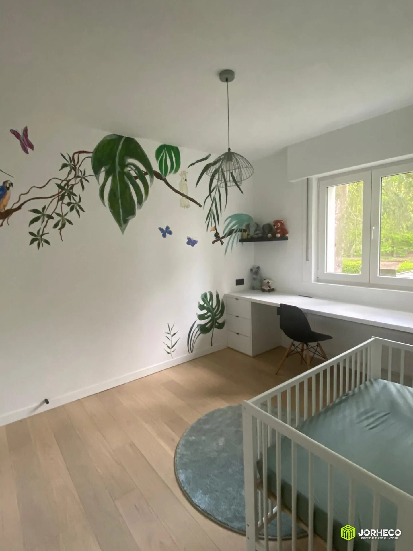 Kinderkamer met muurschildering